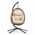 Chaise suspendue en rotin avec coussins beige et support en métal